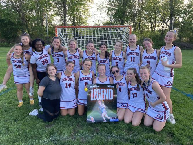 Concord's Emma Pelletier (holding sign) celebrates with her teammates after the Crimson Tide girls' lacrosse team defeated Nashua North, 14-9, on Friday, May 16, 2025 for its first win over the season. Pelletier, a junior captain, scored her 100th career goal in the victory. Concord's Emma Pelletier (holding sign) celebrates with her teammates after the Crimson Tide girls' lacrosse team defeated Nashua North, 14-9, on Friday, May 16, 2025 for its first win over the season. Pelletier, a junior captain, scored her 100th career goal in the victory.