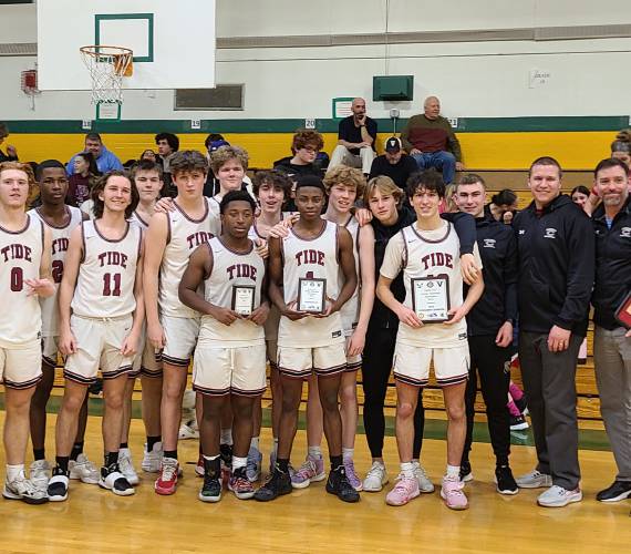 The Concord boys’ basketball team poses with the Capital Classic championship plaque at Bishop Brady High School on Dec. 29, 2022 after defeating Hopkinton, 65-59. After finishing 6-12 last season, one win shy of missing the playoffs, the Crimson Tide are looking to keep improving in 2023-24.