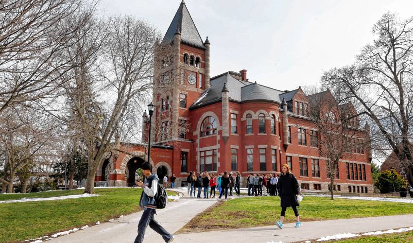In this photo taken Wednesday April 6, 2016 students walk past the historic Thompson Hall at the University of New Hampshire in Durham, N.H. The water system serving the University is among more than two dozen in New Hampshire that have exceeded the federal lead standard at least once in the last three years. In this photo taken Wednesday April 6, 2016 students walk past the historic Thompson Hall at the University of New Hampshire in Durham, N.H. The water system serving the University is among more than two dozen in New Hampshire that have exceeded the federal lead standard at least once in the last three years.