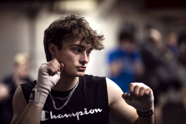 Ronny Philbrick warms up for his boxing class at Averill's Boxing in downtown Concord on March 7, 2024. Philbrick is hoping to box in the future and takes the class with his brother, Ritchie.
