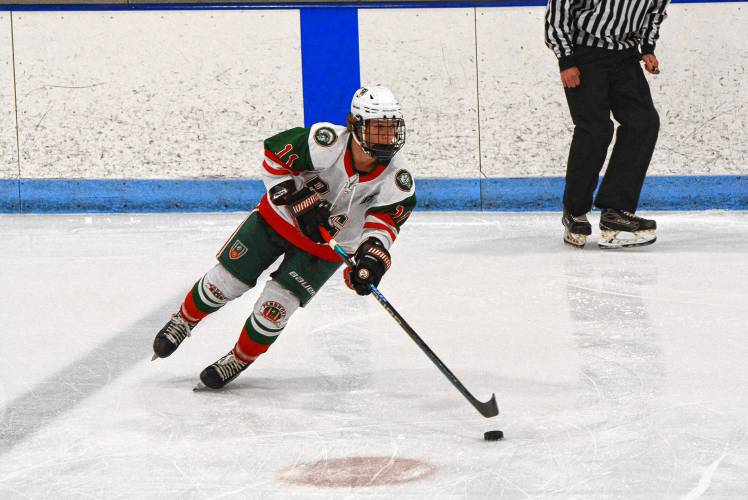 Pembroke-Campbell’s Cam Plumb carries the puck during the Brady Sullivan Christmas Tournament championship at Merrill Fay Arena in Laconia on Thursday, Dec. 28. Plumb was named to the Division III All-State First Team after leading PAC to its first championship game appearance in program history.