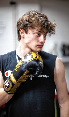 Ronny Philbrick warms up for his boxing class at Averill's Boxing in downtown Concord on March 7, 2024. Philbrick is hoping to box in the future and takes the class with his brother, Ritchie.