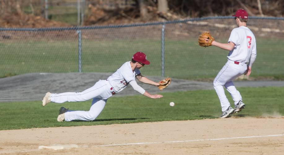 Concord third baseman just misses a foul ball against Windham on Wednesday.