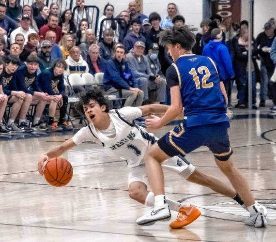 Pembroke guard Evan Berkeley is fouled Bow forward Brendan O’Keeffe during the second half Friday night’s Division II quarterfinal. Pembroke won and will play Pelham in the semifinals on Monday night.