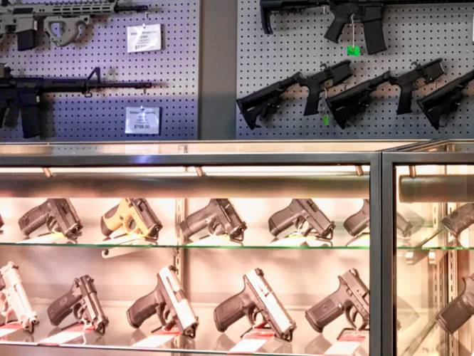 A display case at a New Hampshire gun shop.