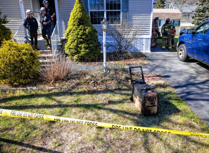 A piece of burned furniture is the only outward sign of the fire at 10 Latern Place in Concord on Thursday, April 25, 2024. One man was sent to Concord Hospital in critical condition after the fire.