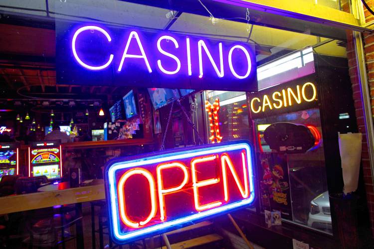 Casino signs at the Draft on South Main Street in Concord.