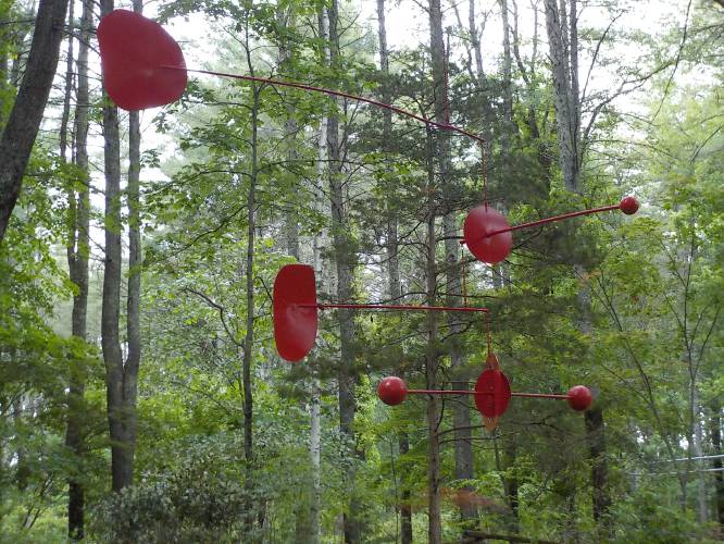 A sculpture in the woods at Bedrock Gardens.
