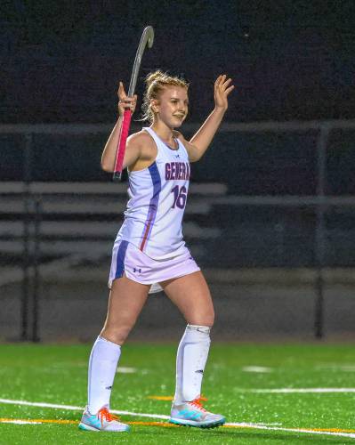 Lauryn Guevin celebrates after scoring one of her two goals during the Division II field hockey semifinals against Souhegan on Oct. 26, 2023.