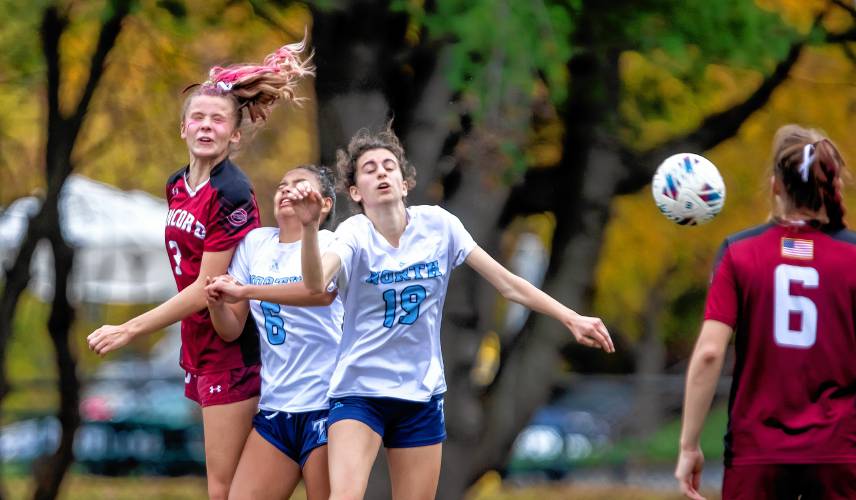 Concord forward Whitney Vaillant battles a pair of Nashua North players during the first half of Concord’s preliminary round match at Memorial Field on Oct. 25. Vaillant was named to the Division I All-State First Team.