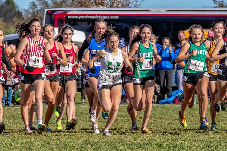 Hopkinton’s Maddy Lane (131) takes off from the starting line with the rest of the pack at the New England Interscholastic Cross Country Championships at Troy Howard Middle School in Belfast, Maine, on Saturday. Lane finished 17th in the girls’ race.