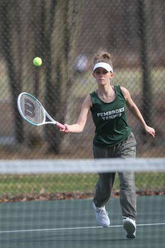 Pembroke No. 1 Kalie Reynolds, a senior, returns a shot in her match on Thursday afternoon. Reynolds rallied well, but fell to Coe-Brown junior Kelli Daniel in their Thursday matchup.