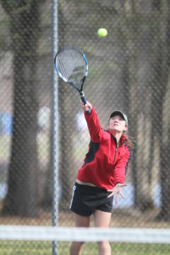 Coe-Brown’s No. 1 player, junior Kelli Daniel, serves during a match on Thursday afternoon. Daniel won her singles and doubles match to lead the Bears against Pembroke.